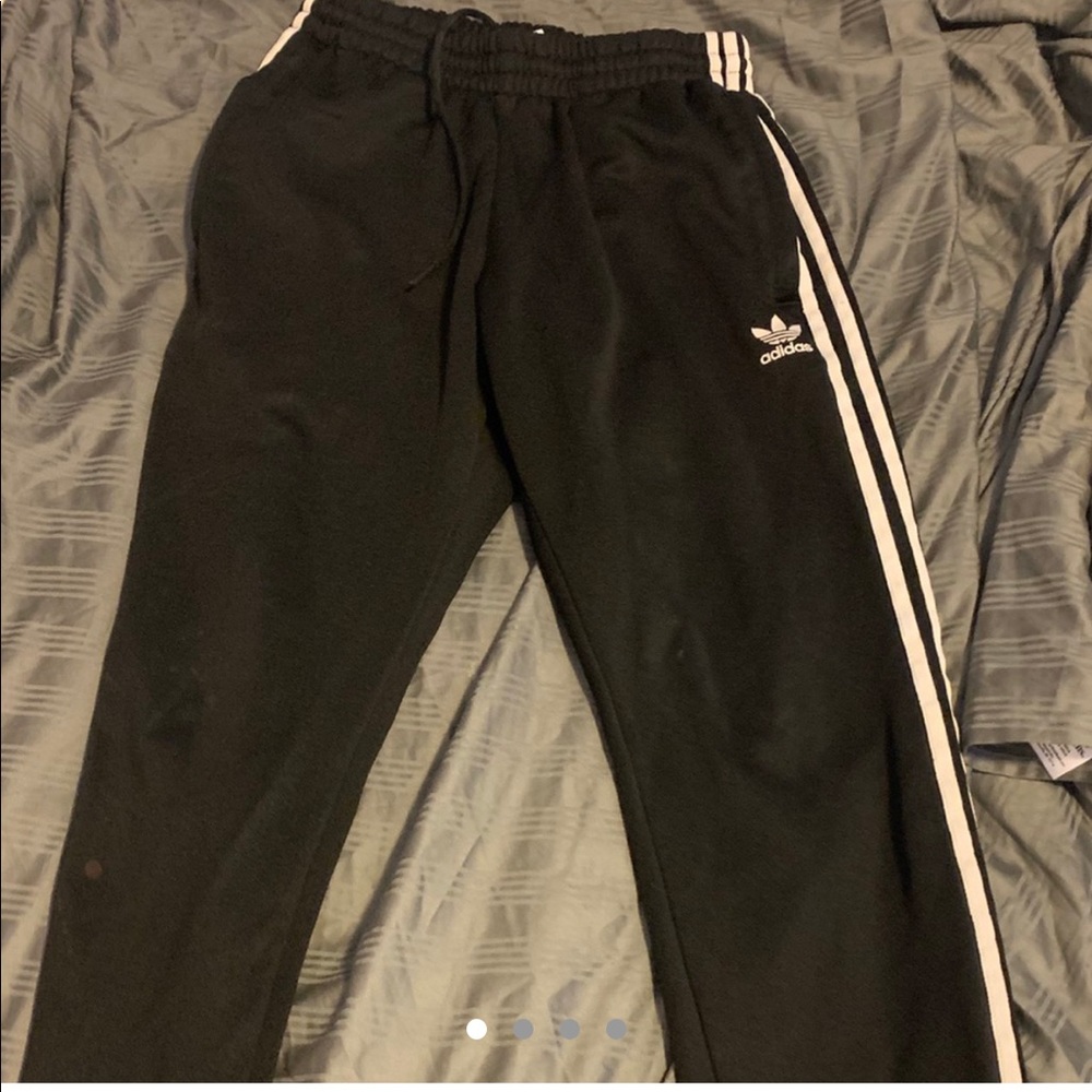 Black with white stripes Adidas joggers